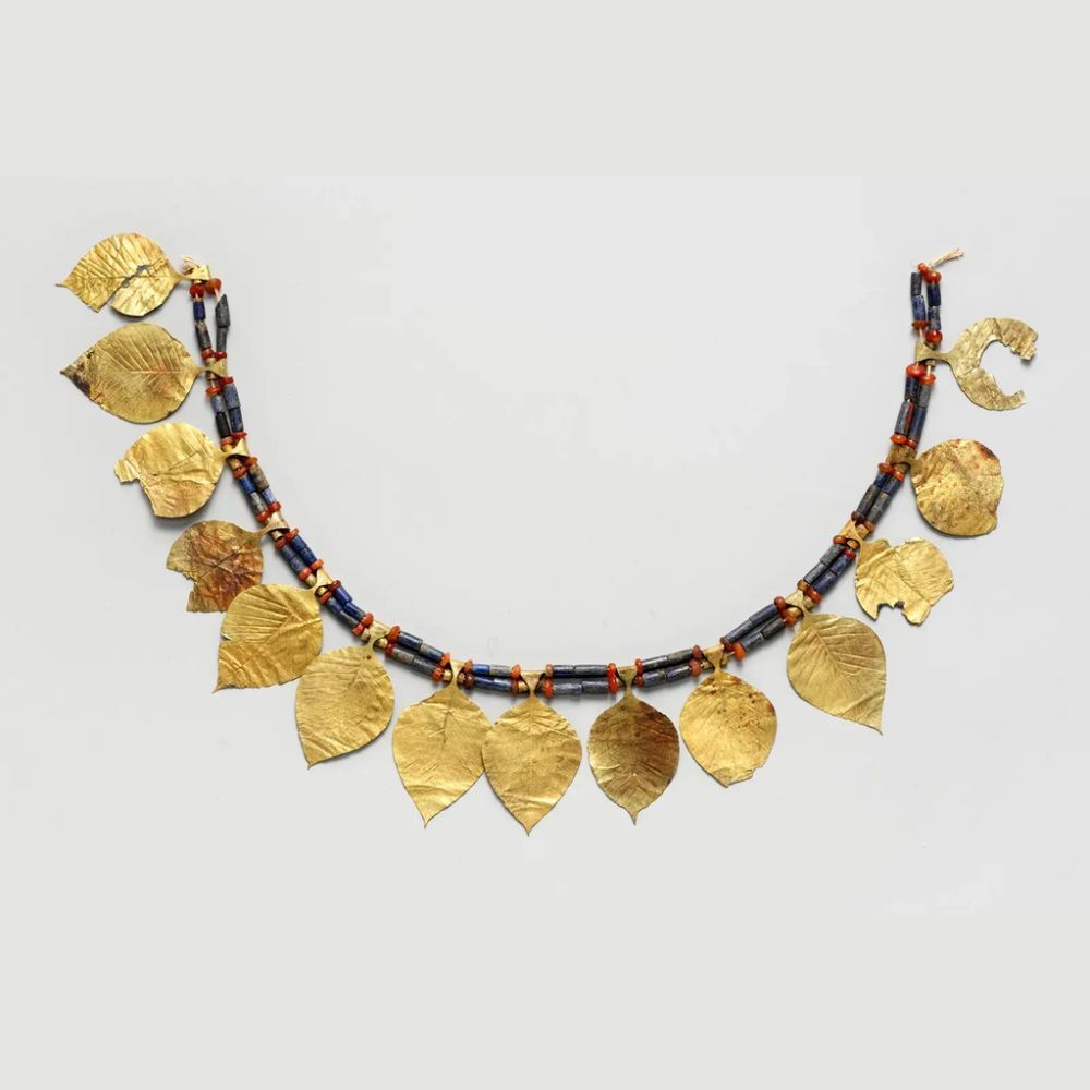 origin of the word jewelry, with a historic necklace